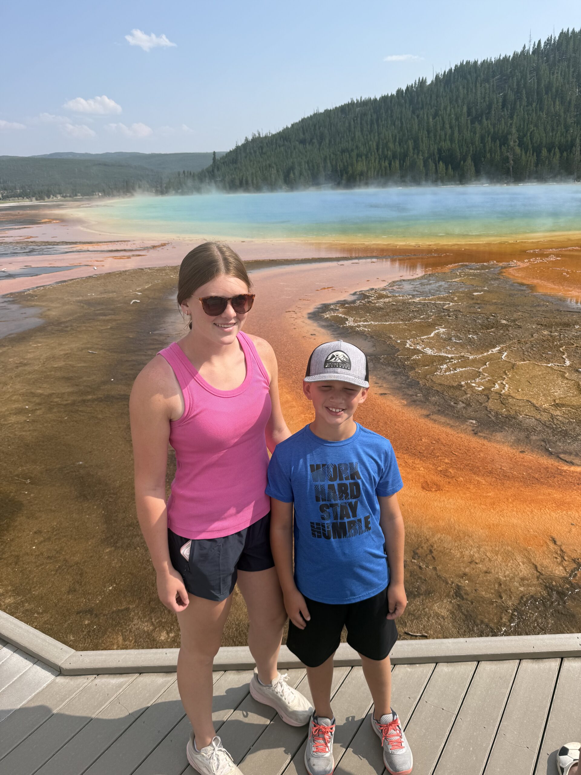 Girl and boy in front of Grand Prismatic 