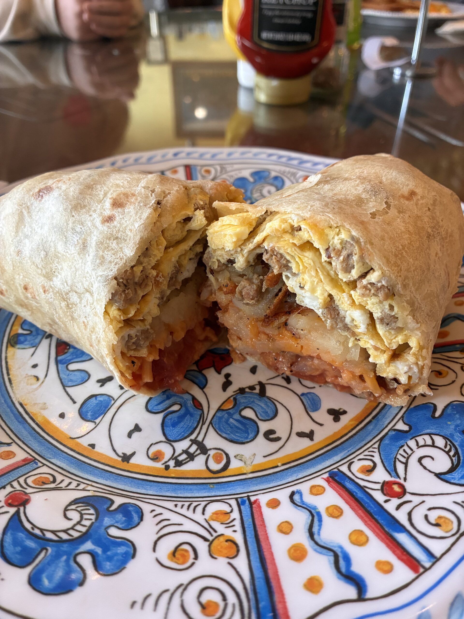 Breakfast Burrito on plate cut open